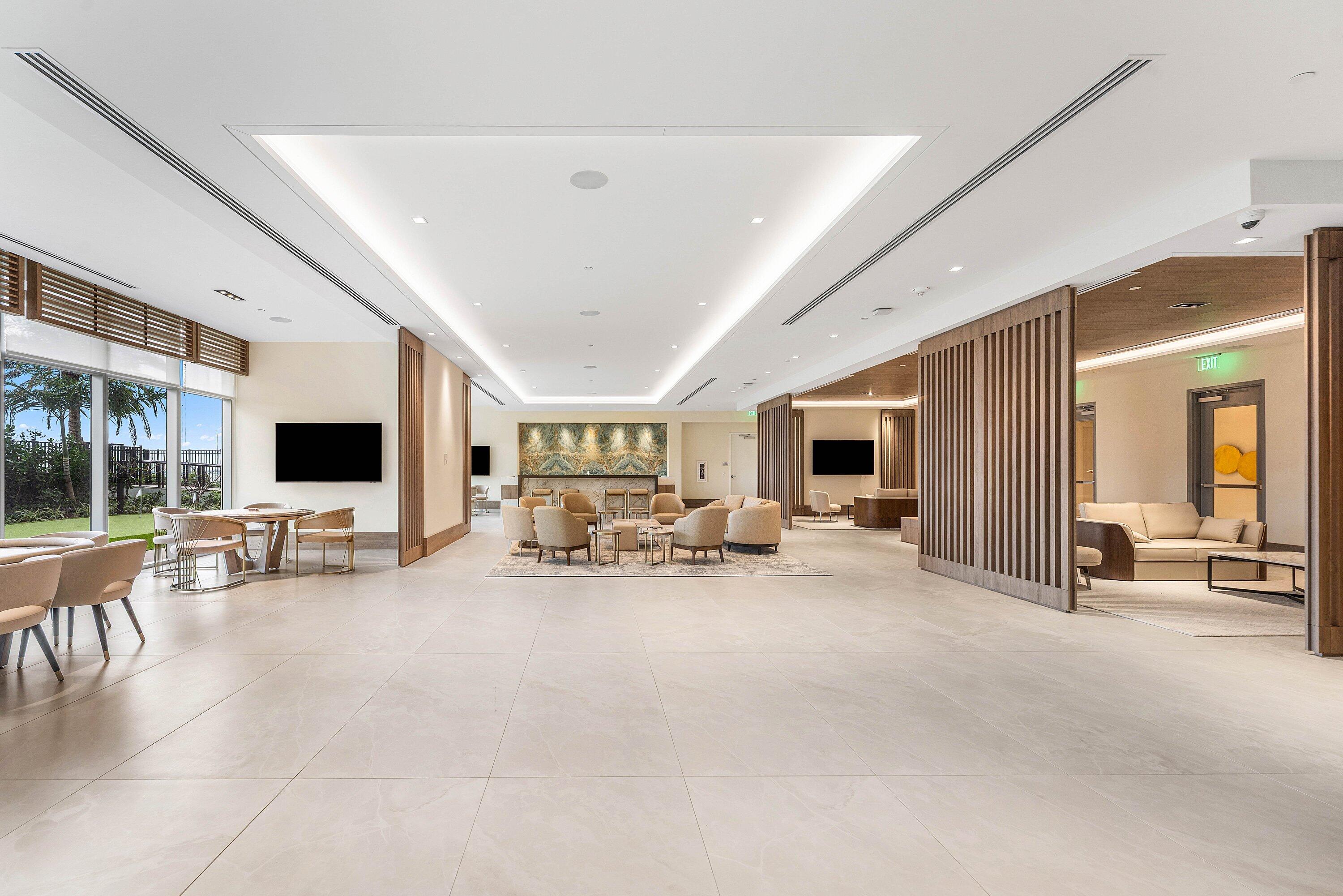 Expansive Nautilus 220 resident clubroom with multiple lounge areas
