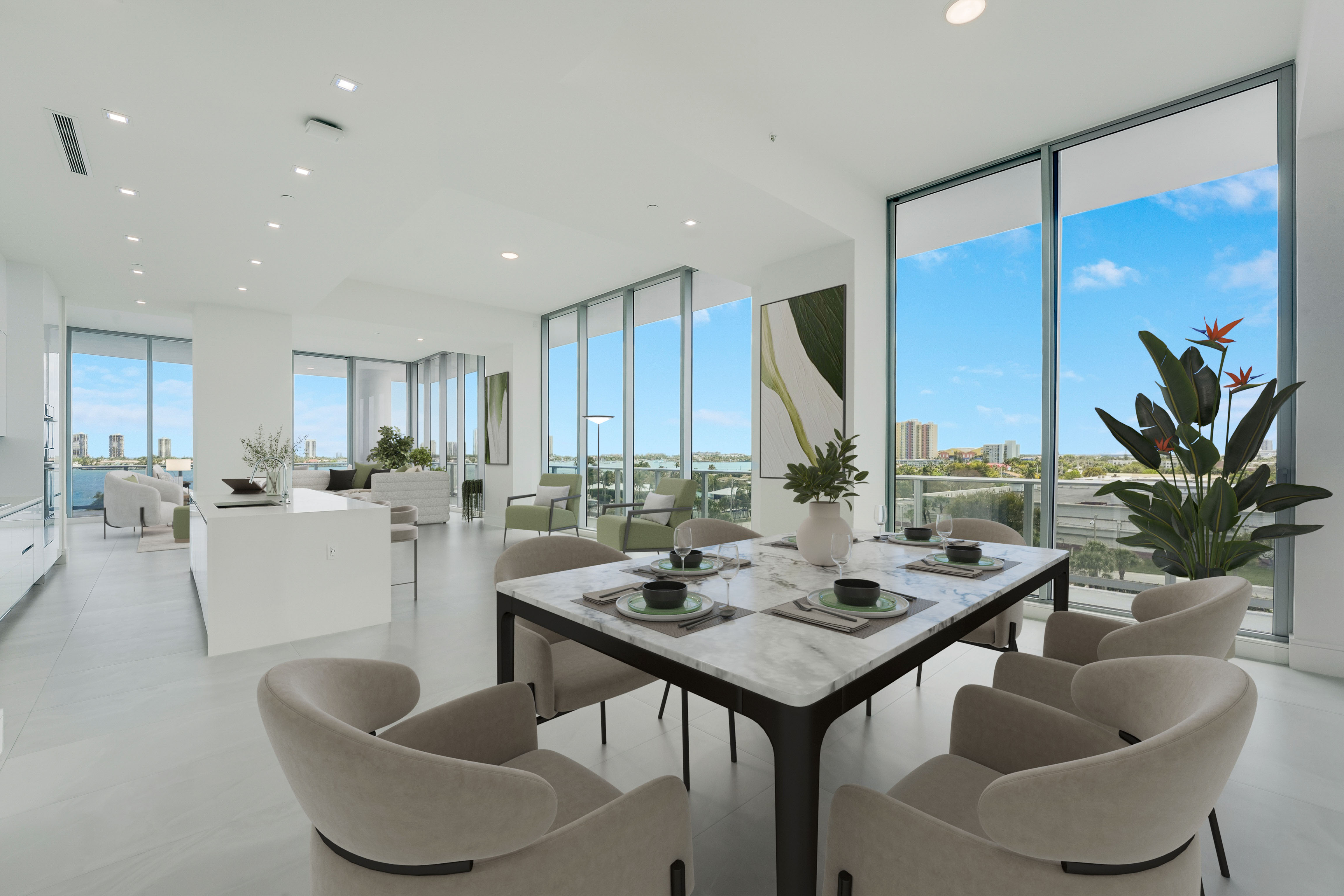 Virtually staged open dining, kitchen and living areas in Residence 612